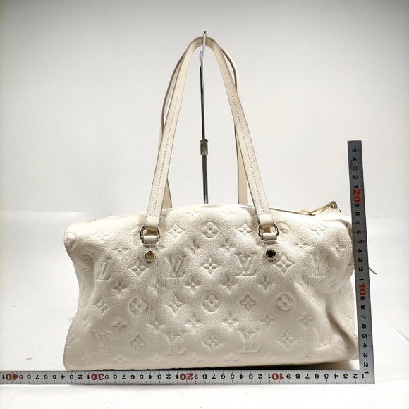 authentic LOUIS VUITTON White Monogram Empreinte Leather Inspiree Bag - Picture 4 of 15